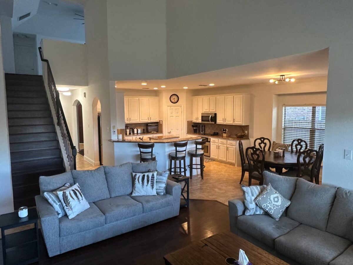 Comfortable family room in sober living home for peer support