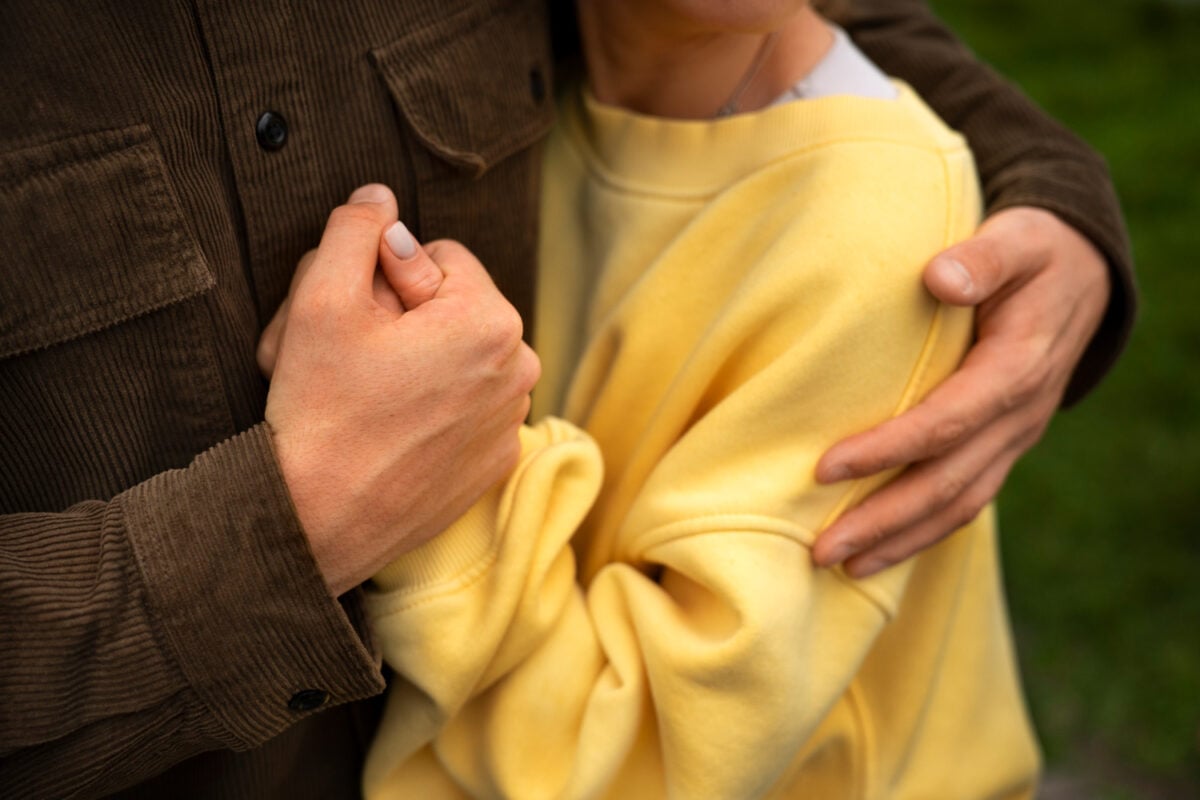 Two people embracing showing emotional support during early recovery journey