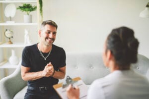 Person offering support to a loved one during addiction recovery